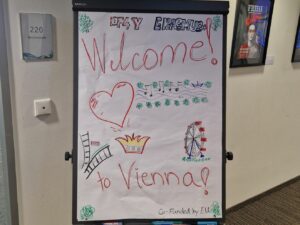 Plakat mit "Willkommens" Aufschrift